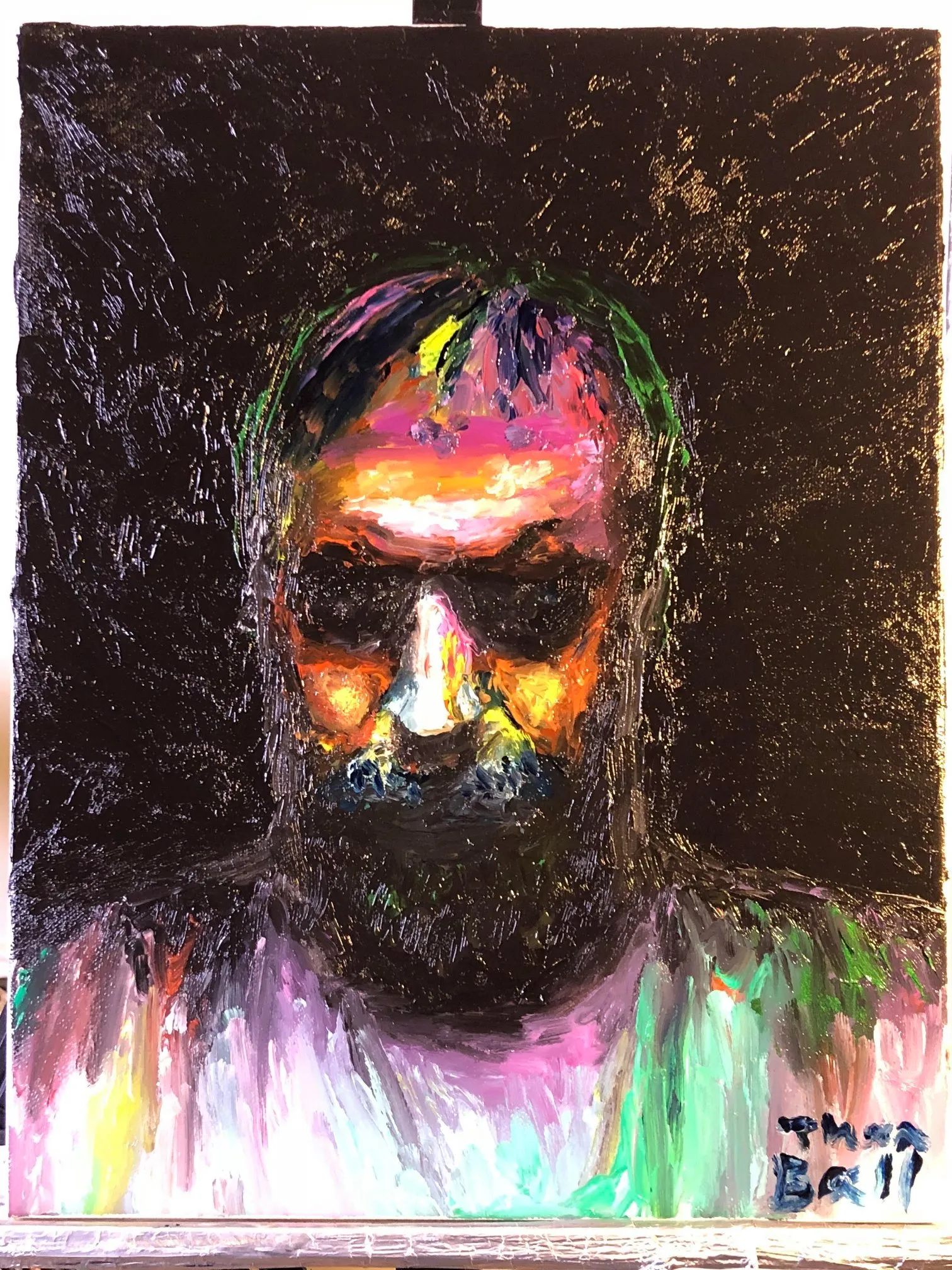 Thickly textured portrait of a bearded man in glowing orange, yellow and pink against a dark background